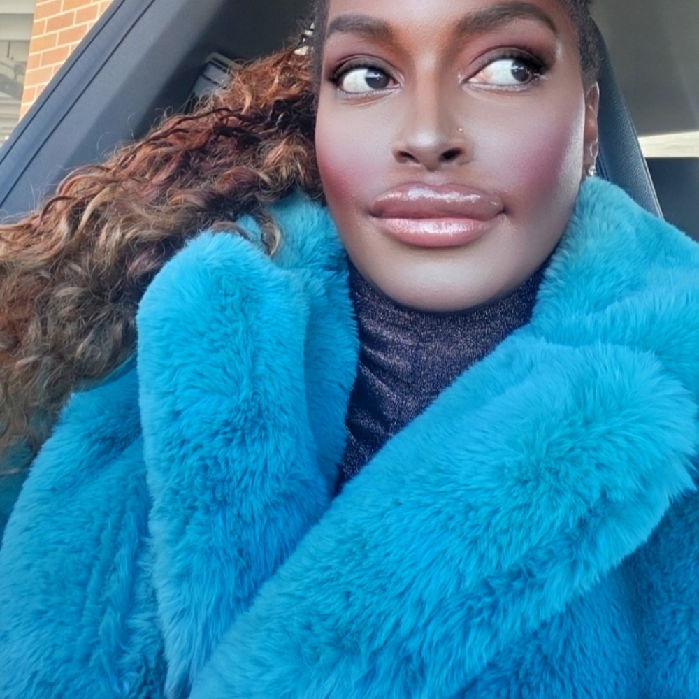 Blue cropped faux fur coat